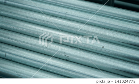 Stack of galvanized steel pipes close up Stack of galvanized steel pipes close up 141024778