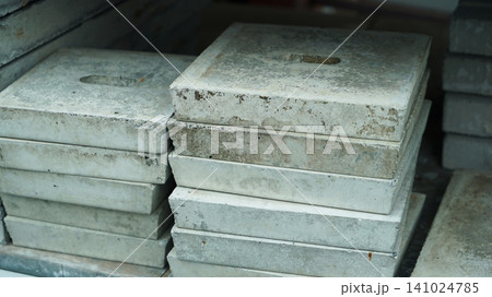 Stacked concrete paving blocks close up 141024785