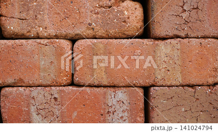 Stacked Red Clay Bricks for Construction Use Stacked Red Clay Bricks for Construction Use 141024794
