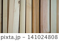 Vertical samples of natural pine lumber planks and timber boards 141024808