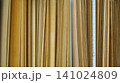 Vertical samples of thin wood veneer sheets and boards 141024809