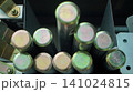 Zinc plated solid steel anchoring pins stored vertically in a bin 141024815