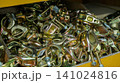 Zinc plated steel scaffolding clamps in a storage box 141024816