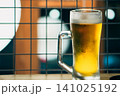 飲みかけのグラスビール	 141025192