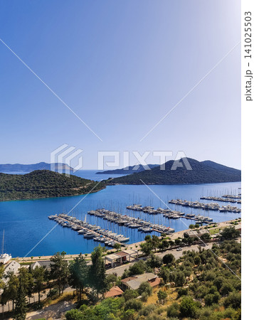 beautiful ships and boats are moored near the shore beautiful ships and boats are moored near the shore 141025503