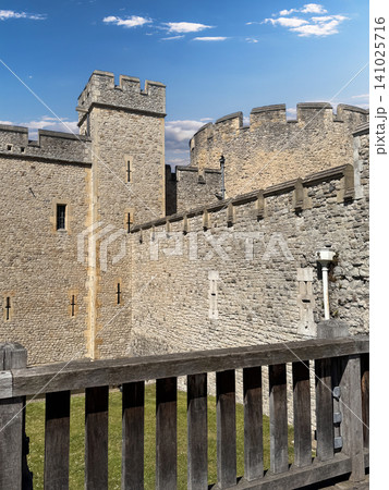 Medieval Tower of London Stone Castle Walls and Tower Fortress With Battlements Under Blue Sky Medieval Tower of London Stone Castle Walls and Tower Fortress With Battlements Under Blue Sky 141025716