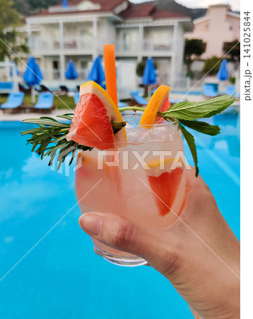 close up of a beautiful fruity alcoholic cocktail 141025844