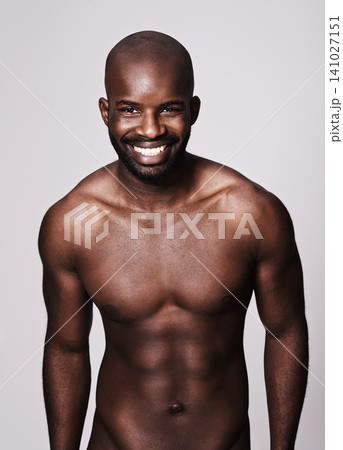 Black man, topless and body with abs in portrait, fitness and health with muscle on dark background. Exercise, sport and athlete with six pack, confident and masculine with testosterone in studio 141027151