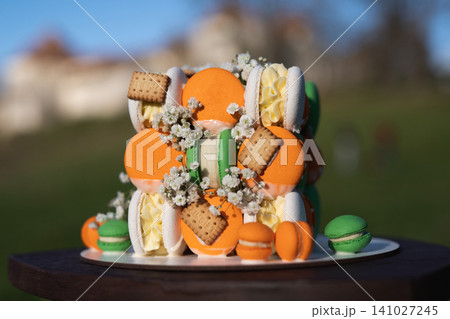 beautiful and colorful delicious fresh sweet cake decorated with macaroon beautiful and colorful delicious fresh sweet cake decorated with macaroon 141027245