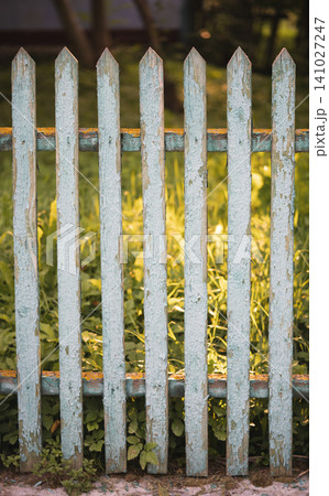 beautiful wooden fence in the village in the contrast sunlight beautiful wooden fence in the village in the contrast sunlight 141027247
