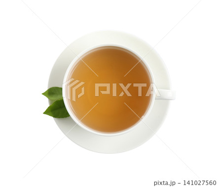 Cup of green tea and leaves isolated on white, top view Cup of green tea and leaves isolated on white, top view 141027560