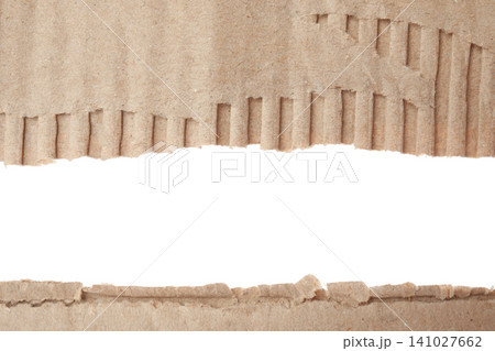 Pieces of torn cardboard isolated on white Pieces of torn cardboard isolated on white 141027662