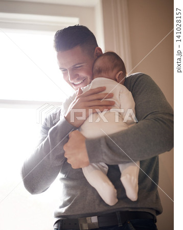 Father, baby and hug in a family home with smile, support and love together with bonding. Trust, dad and young newborn with care and development in a new house with happy and proud man at a window Father, baby and hug in a family home with smile, support and love together with bonding. Trust, dad and young newborn with care and development in a new house with happy and proud man at a window 141028157