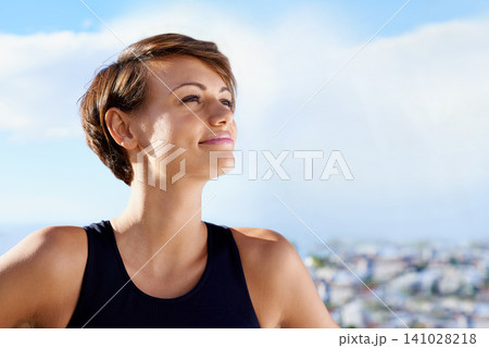 Woman, smile and wellness with blue sky for fitness, training goal or thinking of exercise in nature. Athlete, active person and face or happy outdoor in summer with sportswear for workout session Woman, smile and wellness with blue sky for fitness, training goal or thinking of exercise in nature. Athlete, active person and face or happy outdoor in summer with sportswear for workout session 141028218