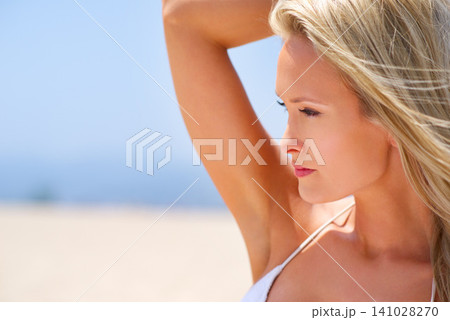 Woman, sand and outdoor beach vacation, travel and summer satisfaction for peace and ocean. Female person, breeze and profile for holiday to sea on weekend, nature and relax on tropical island Woman, sand and outdoor beach vacation, travel and summer satisfaction for peace and ocean. Female person, breeze and profile for holiday to sea on weekend, nature and relax on tropical island 141028270
