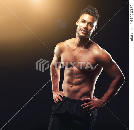 Fitness, portrait and man in studio with mockup, confidence and workout routine in health, wellness and power. Flare, pride and strong bodybuilder on black background for exercise, results and muscle Fitness, portrait and man in studio with mockup, confidence and workout routine in health, wellness and power. Flare, pride and strong bodybuilder on black background for exercise, results and muscle 141028322