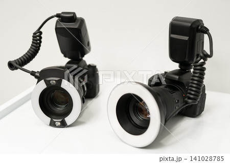 Two professional DSLR cameras with ring flashes for dental photography 141028785