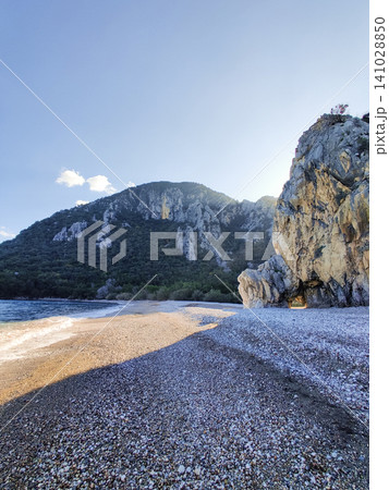 beautiful landscape of a sandy beach on the sea beautiful landscape of a sandy beach on the sea 141028850