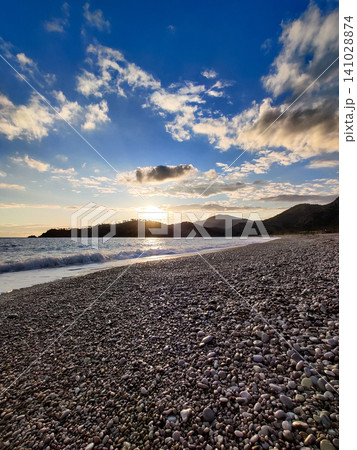 beautiful landscape of a sandy beach on the sea 141028874