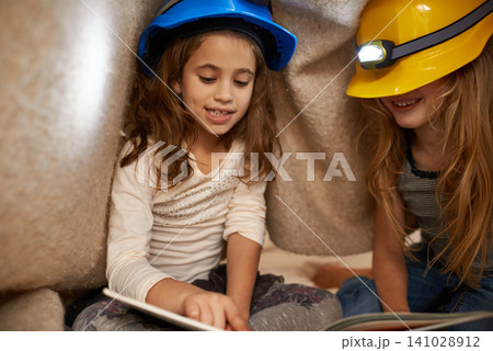 Lights, girls and kids with a book, happiness and fairytale with fun and bonding together with vacation. Blanket, home and headlamp with children or reading adventure story with with friends or relax Lights, girls and kids with a book, happiness and fairytale with fun and bonding together with vacation. Blanket, home and headlamp with children or reading adventure story with with friends or relax 141028912