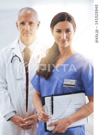 Doctor, nurse and happy with partner in portrait with documents, charts and wellness in hospital. Medic, man and woman in team with graph paper for healthcare services in clinic with pride for job Doctor, nurse and happy with partner in portrait with documents, charts and wellness in hospital. Medic, man and woman in team with graph paper for healthcare services in clinic with pride for job 141028948