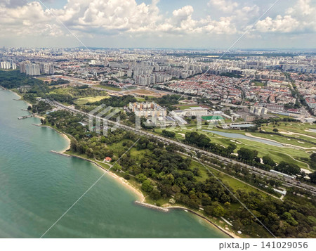 Aerial view of coastal area and urban landscape near Singapore 141029056