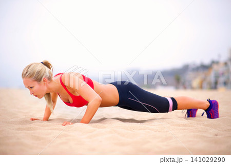 Woman, pushup and training by beach, exercise and practice for strength in sportswear. Female person, outdoors and fitness for healthy body on sand, muscle and cardio challenge for active workout Woman, pushup and training by beach, exercise and practice for strength in sportswear. Female person, outdoors and fitness for healthy body on sand, muscle and cardio challenge for active workout 141029290