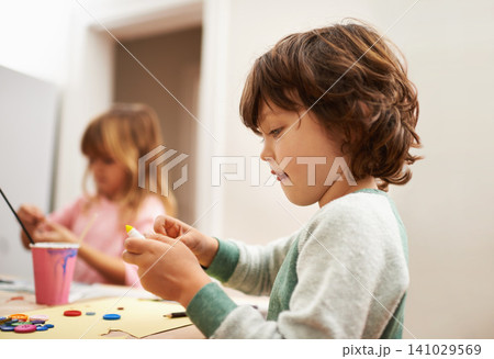 Little boy, paint and art with decor for creativity, craft or color in learning, education or development at home. Young child with paintbrush for colorful decoration, artwork or imagination at house Little boy, paint and art with decor for creativity, craft or color in learning, education or development at home. Young child with paintbrush for colorful decoration, artwork or imagination at house 141029569