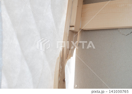 Broken wooden bed frame with a severely split pine timber beam Broken wooden bed frame with a severely split pine timber beam 141030765