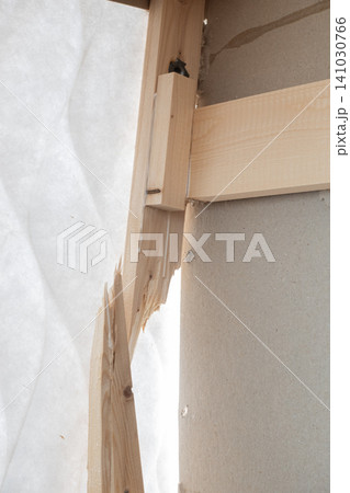 Broken wooden bed frame with a severely split pine timber beam vertical format Broken wooden bed frame with a severely split pine timber beam vertical format 141030766