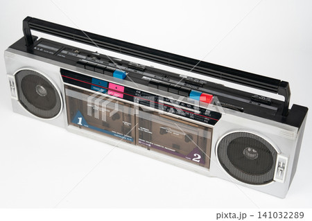 Vintage silver double cassette boombox isolated on white background Vintage silver double cassette boombox isolated on white background 141032289