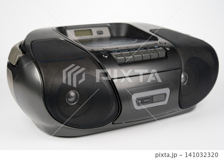 Black portable CD radio cassette player with MP3 playback isolated on white Black portable CD radio cassette player with MP3 playback isolated on white 141032320