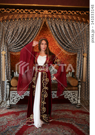 portrait of a young girl in luxury Turkish Ottoman dress in Turkey portrait of a young girl in luxury Turkish Ottoman dress in Turkey 141033148