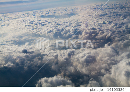 beautiful thick clouds in the sky from the height of the plane beautiful thick clouds in the sky from the height of the plane 141033264