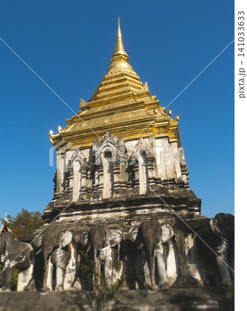 Ancient Chedi Chang Lom at Wat Chiang Man temple with elephant statues in Chiang Mai Ancient Chedi Chang Lom at Wat Chiang Man temple with elephant statues in Chiang Mai 141033633