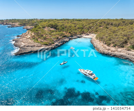 Aerial view of yachts and boats in Cala Mondrago, Mallorca, Spain Aerial view of yachts and boats in Cala Mondrago, Mallorca, Spain 141034754