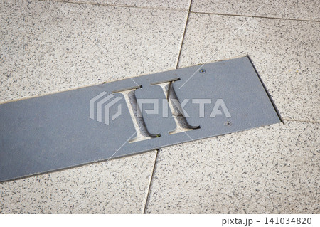 Roman numerical number two made of stone tiles on street Roman numerical number two made of stone tiles on street 141034820