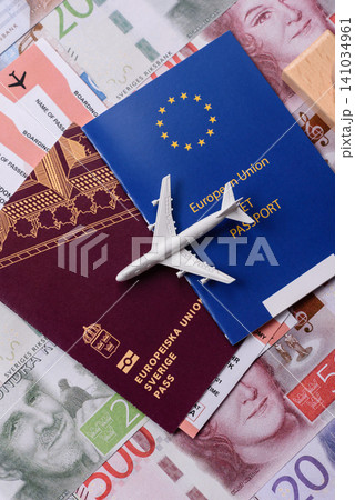 Sweden, swedish passport or id document with tickets for flight, travel. Swedish passport Sweden, swedish passport or id document with tickets for flight, travel. Swedish passport 141034961
