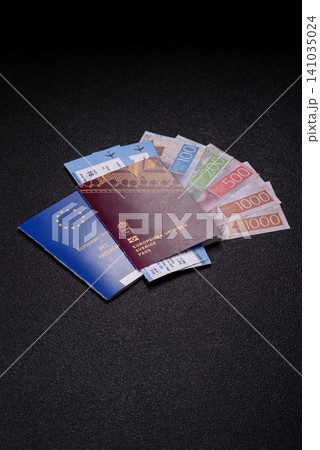 Sweden, swedish passport or id document with tickets for flight, travel. Swedish passport Sweden, swedish passport or id document with tickets for flight, travel. Swedish passport 141035024