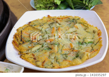 Crispy Pan Fried Traditional Korean Potato Pancake Gamjajeon Crispy Pan Fried Traditional Korean Potato Pancake Gamjajeon 141035297