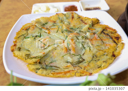 Crispy Pan Fried Traditional Korean Potato Pancake Gamjajeon Crispy Pan Fried Traditional Korean Potato Pancake Gamjajeon 141035307