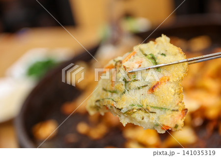 Crispy Pan Fried Traditional Korean Potato Pancake Gamjajeon Crispy Pan Fried Traditional Korean Potato Pancake Gamjajeon 141035319