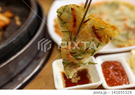 Crispy Pan Fried Traditional Korean Potato Pancake Gamjajeon Crispy Pan Fried Traditional Korean Potato Pancake Gamjajeon 141035329