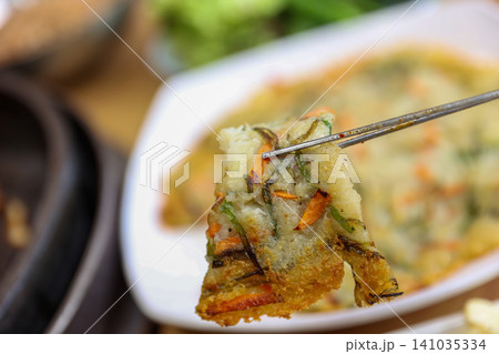 Crispy Pan Fried Traditional Korean Potato Pancake Gamjajeon Crispy Pan Fried Traditional Korean Potato Pancake Gamjajeon 141035334