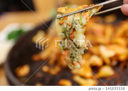 Crispy Pan Fried Traditional Korean Potato Pancake Gamjajeon Crispy Pan Fried Traditional Korean Potato Pancake Gamjajeon 141035338