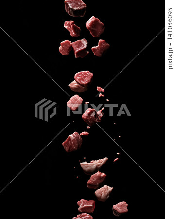 Raw beef chunks falling: food, meat, raw, beef, red, chunks, falling, cooking, ingredient, protein Raw beef chunks falling: food, meat, raw, beef, red, chunks, falling, cooking, ingredient, protein 141036095
