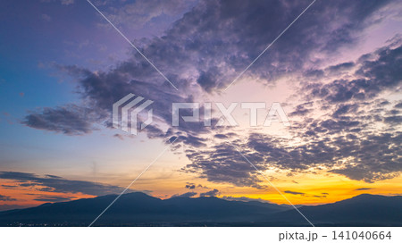 aerial view of colorful sky above the mountain. aerial view of colorful sky above the mountain. 141040664