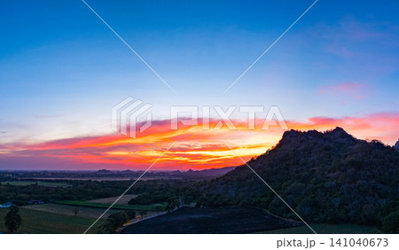Aerial view of colorful Sunset Over sunflower field. Aerial view of colorful Sunset Over sunflower field. 141040673