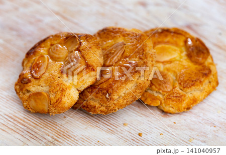 Crispy almond cookies served for dessert 141040957