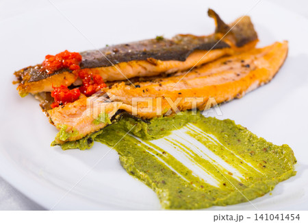 Grilled trout with sauces 141041454